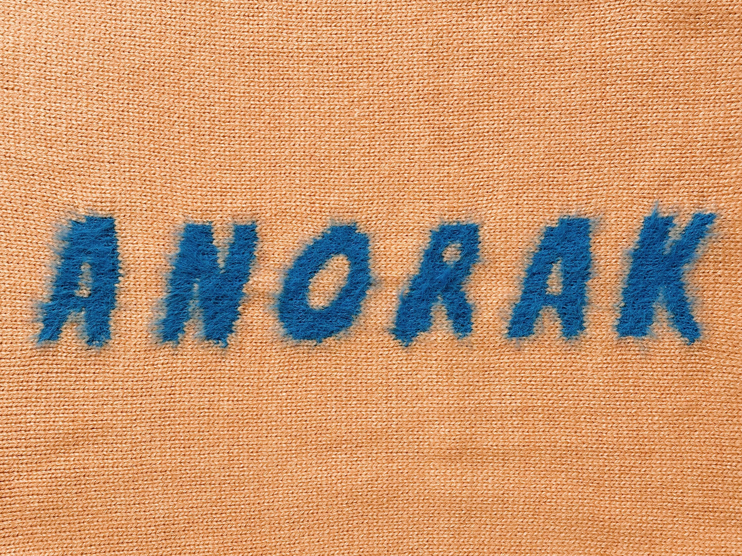 SLEEVE LOGO KNIT TOP