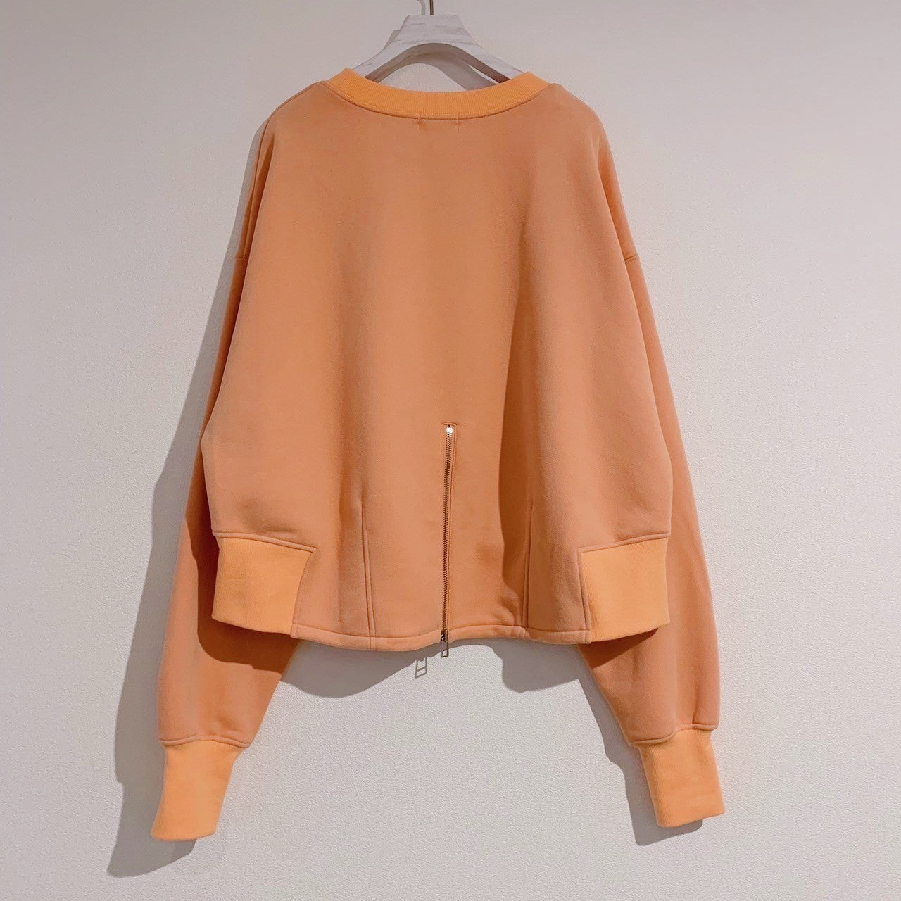 BACK ZIP SWEATSHIRT